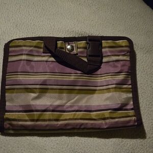 Thirty-One Brown and Purple Toiletry Bag with Modern Stripes. Pockets and Folds